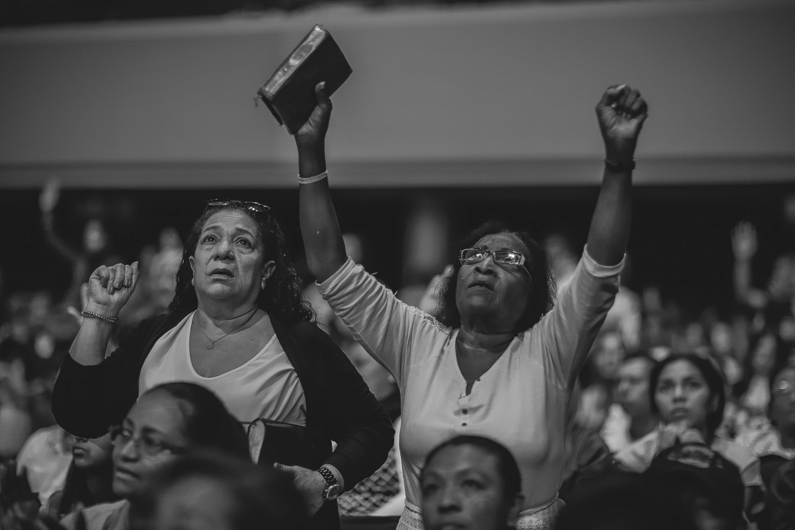 grayscale-photography-of-people-worshiping-2774570